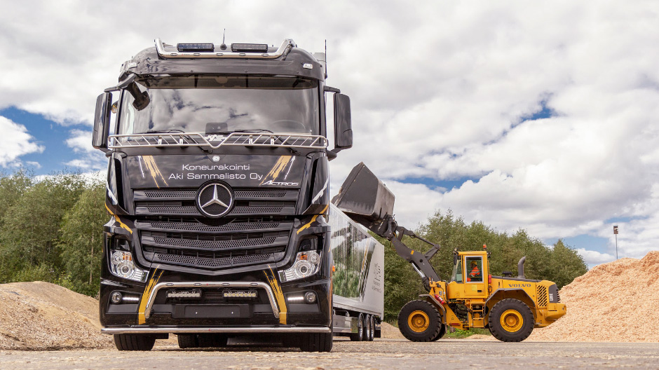 Sheer power and endurance. An Actros 3363 8x4 from KAS being loaded with wood chip, an important freight load for the company.